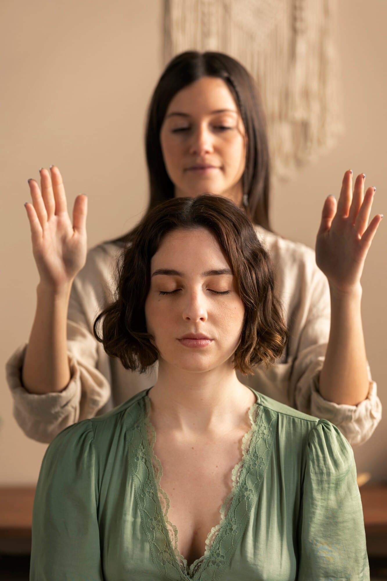 Hypnotherapy session with practitioner guiding a relaxed client